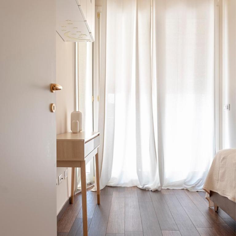Domio - Elegante oasi con Terrazza - Two-Bedroom Apartment - 20
