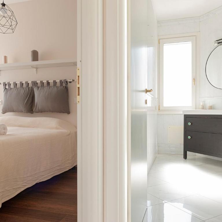 Domio - Elegante oasi con Terrazza - Two-Bedroom Apartment - 21