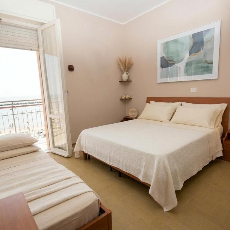 30 Trilocale fronte mare - Appartamento con 2 Camere da Letto - 6