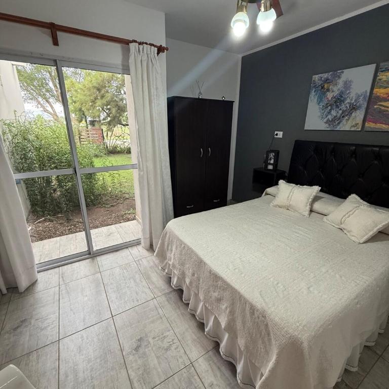 Hospedaje Familiar el Nispero Alojamiento en Oncativo - Two-Bedroom Apartment - 18