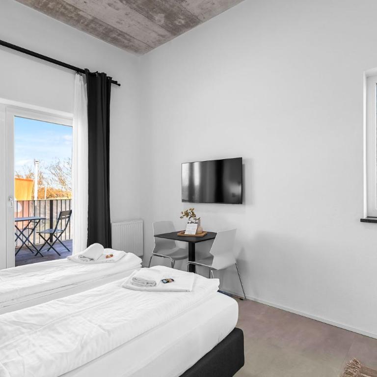 SKYRISE Apartments mit Küche, WLAN & Parkplatz - ruhige Lage - Studio mit Balkon - 16