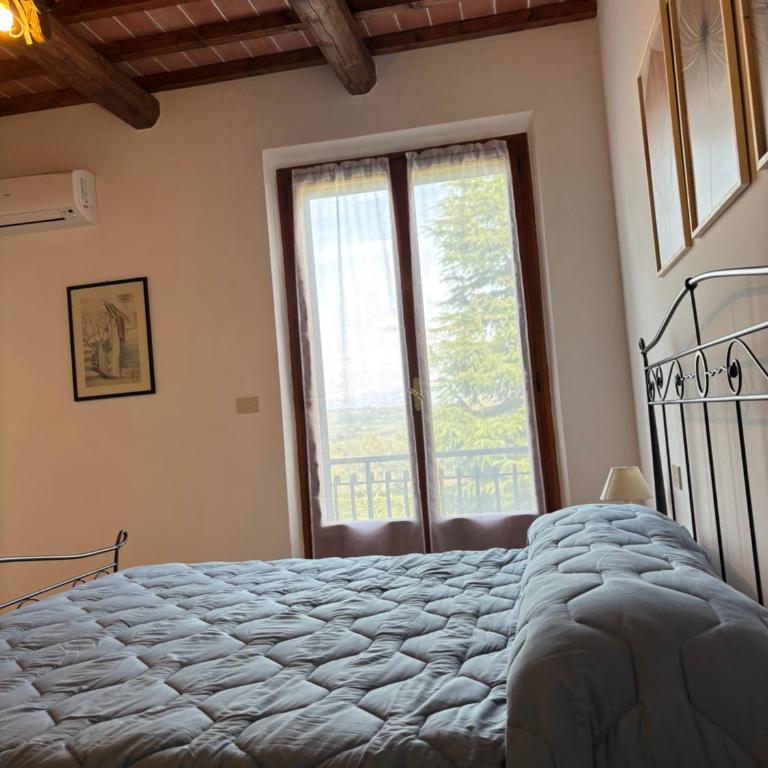 Agriturismo Azienda Agricola La Roccaia - Camera Matrimoniale con Vista Giardino - 6