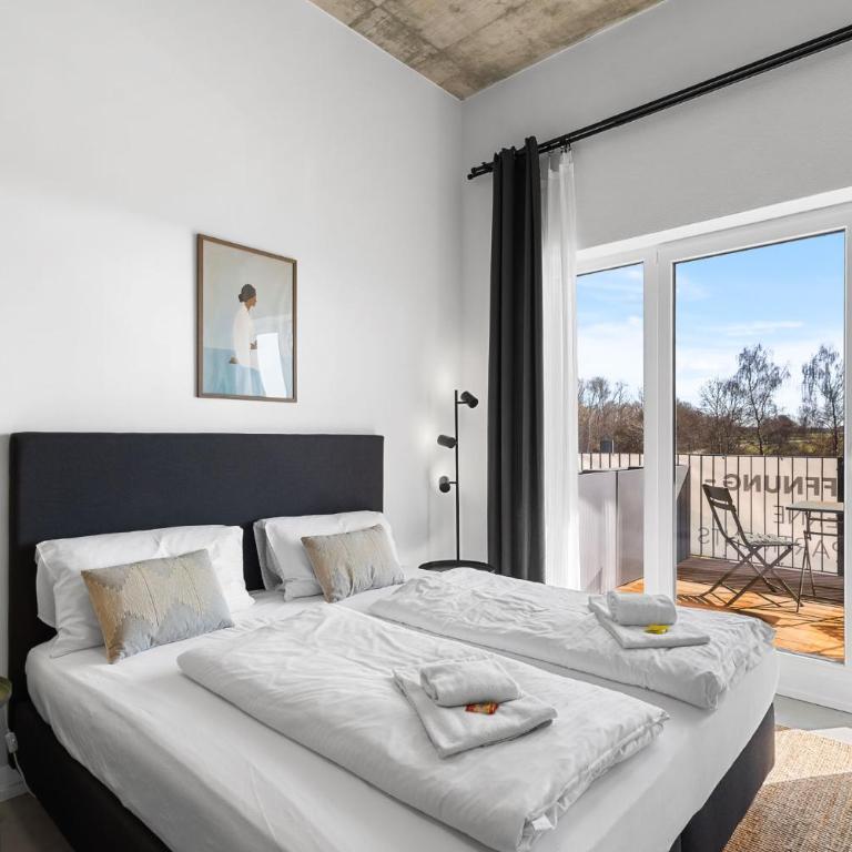 SKYRISE Apartments mit Küche, WLAN & Parkplatz - ruhige Lage - Studio mit Balkon - 13