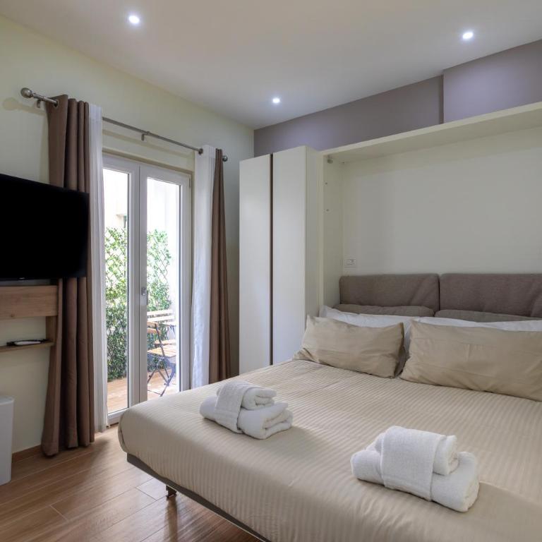 Maya Casa - Monolocale con Balcone - 11