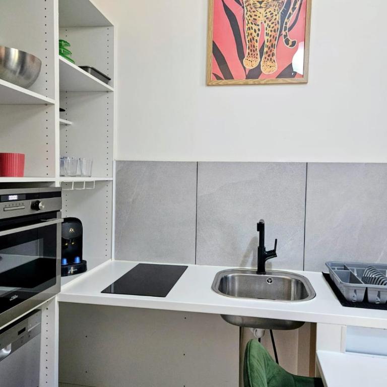 Villa Oasis - Appartements à thèmes - Appartement avec Accès pour Personnes à Mobilité Réduite - 11