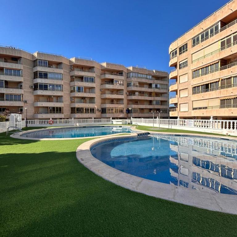 Apartamento completo en Santa Pola cerca de la playa, con piscina y parking - Apartamento de 2 dormitorios - 1