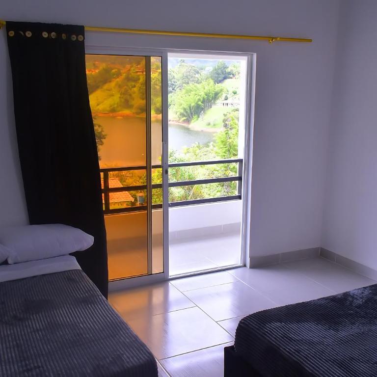 Preciosa Finca con Increíble vista frente al embalse de Guatapé con jacuzzi - Casa Vacacional de 3 dormitorios - 23