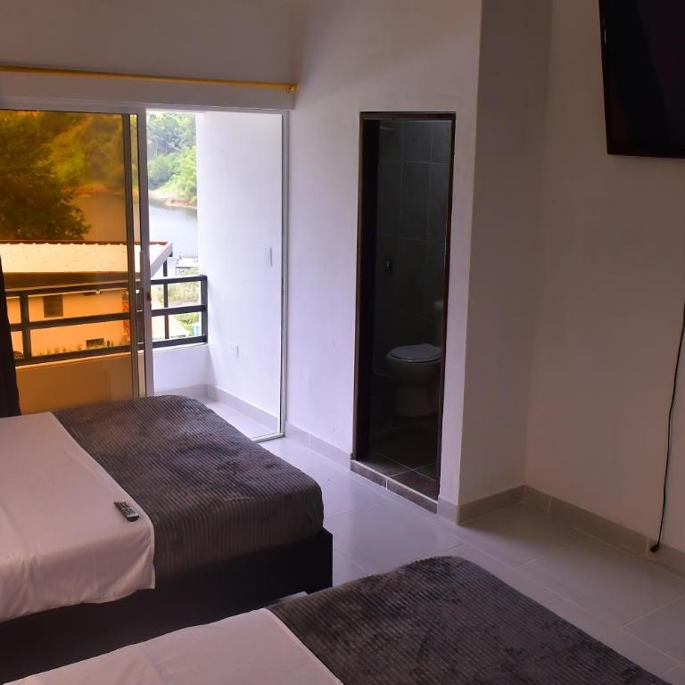 Preciosa Finca con Increíble vista frente al embalse de Guatapé con jacuzzi - Casa Vacacional de 3 dormitorios - 32