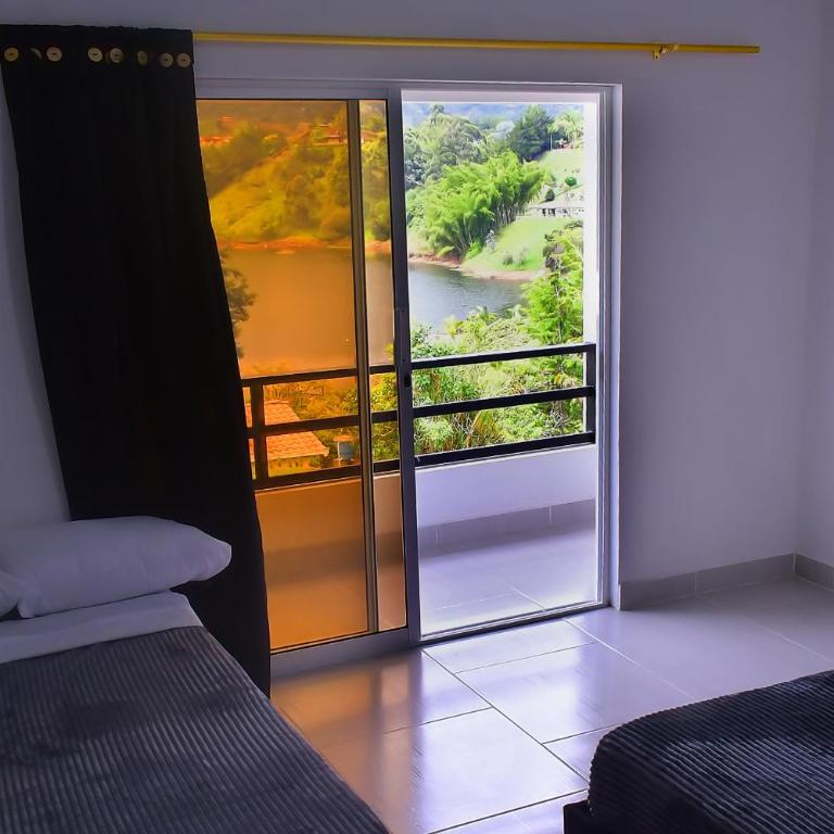 Preciosa Finca con Increíble vista frente al embalse de Guatapé con jacuzzi - Casa Vacacional de 3 dormitorios - 34