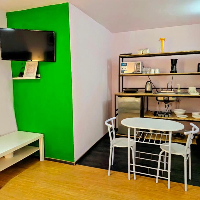 Suite Verde amplia para 6 huéspedes Espacios cómodos, diseño relajante y ubicación céntrica - Vacation Home - 59