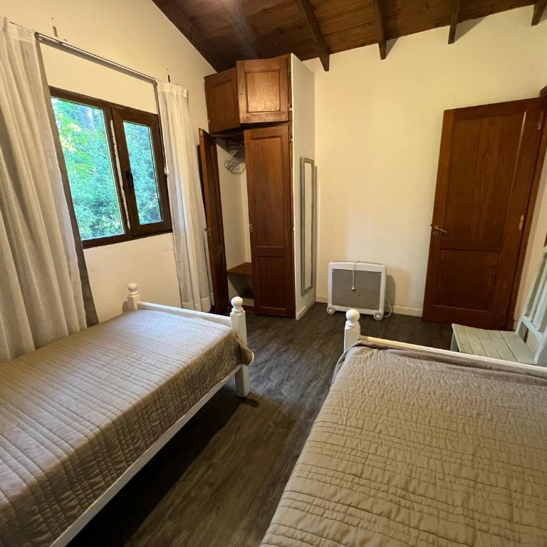 Casa para 16 personas en el corazon de Carilo - Casa de 6 dormitorios - 11