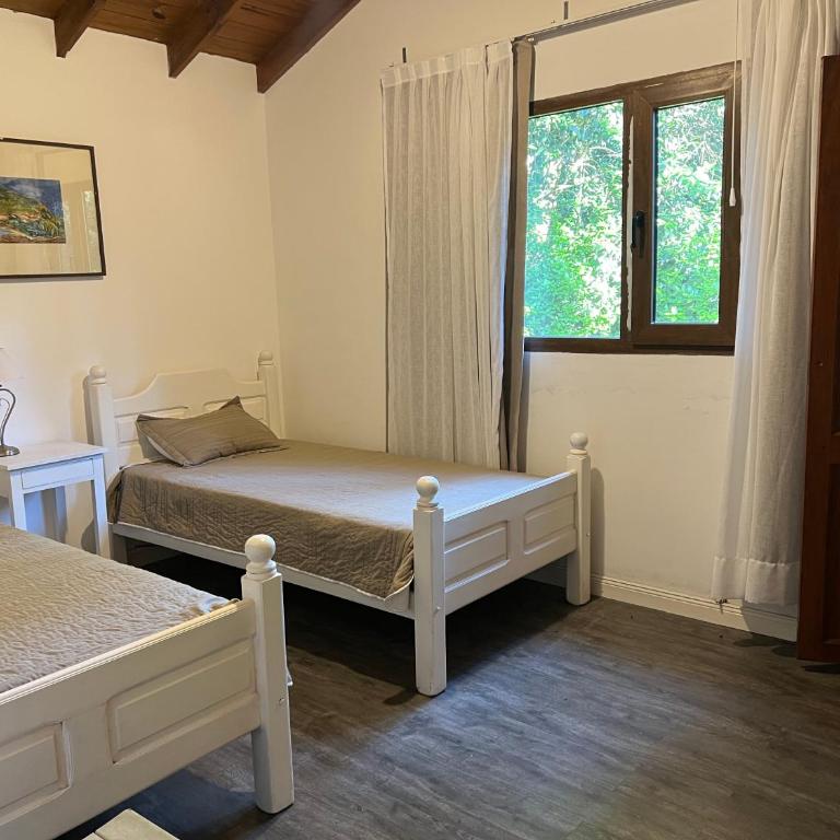 Casa para 16 personas en el corazon de Carilo - Casa de 6 dormitorios - 24