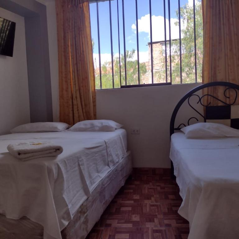 LA ACOGEDORA Qori Wasi - Habitación Doble con baño compartido - 2 camas - 2