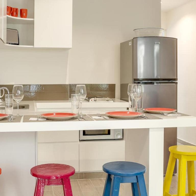 Valentina Suites by Las Flores Vacation Rentals - One-Bedroom Apartment with Garden View - 12
