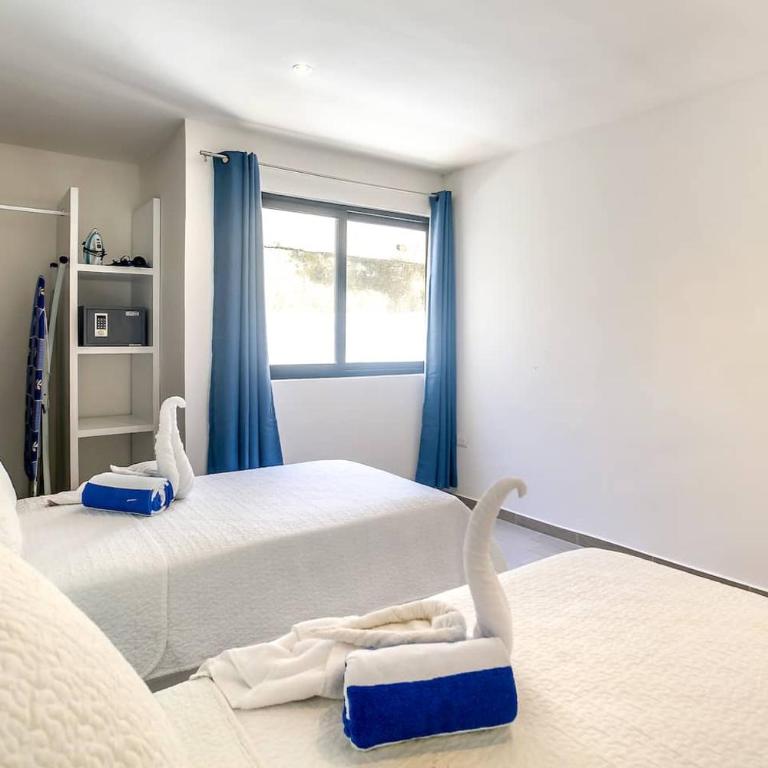 Valentina Suites by Las Flores Vacation Rentals - One-Bedroom Apartment with Garden View - 11