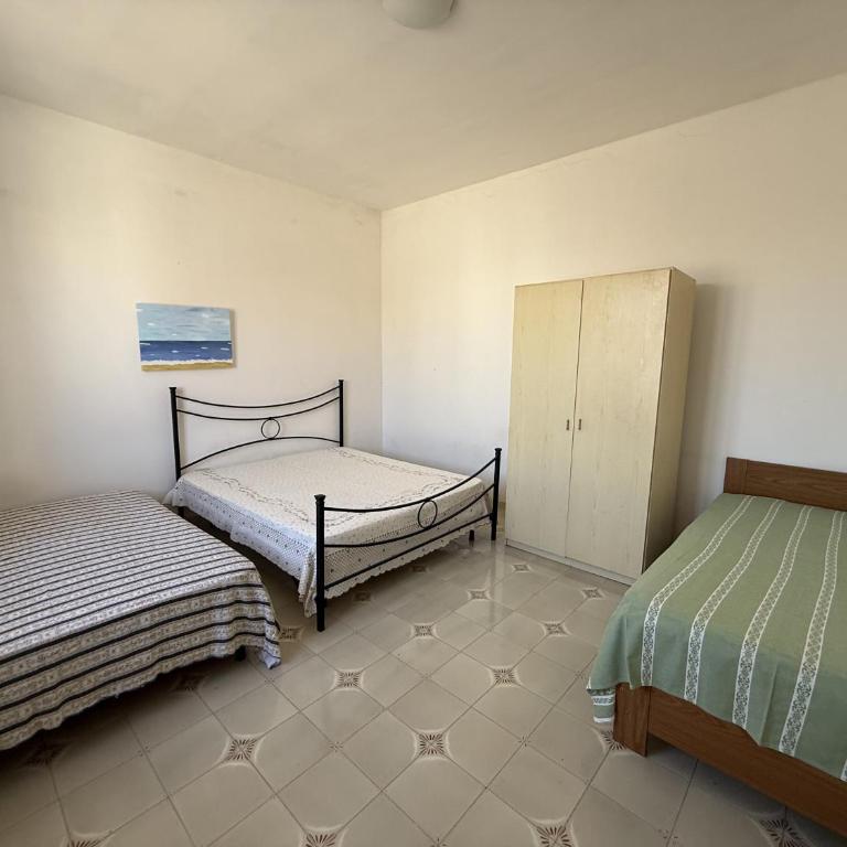 Casa vacanza Ninetta a Torre Lapillo con cortile - Appartamento con 2 Camere da Letto - 4