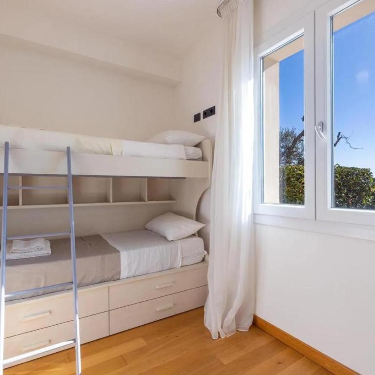 Residence Le Piscine - Appartamento con 2 Camere da Letto e Vista Giardino - 16