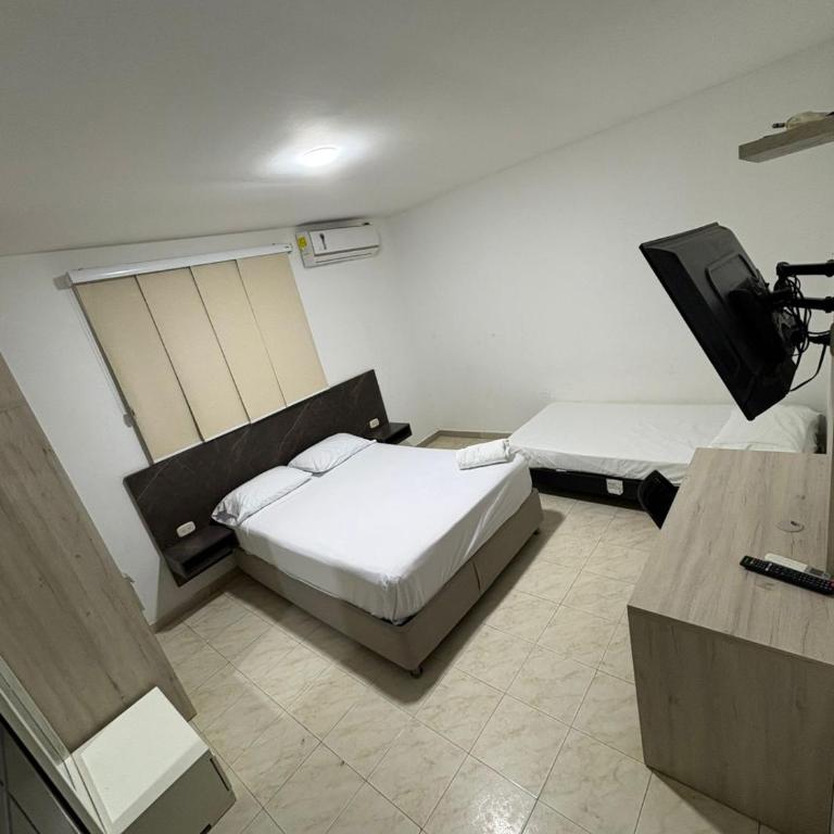 Hotel y Piscina Villa Maria Uribia - Standard Triple Room - 1