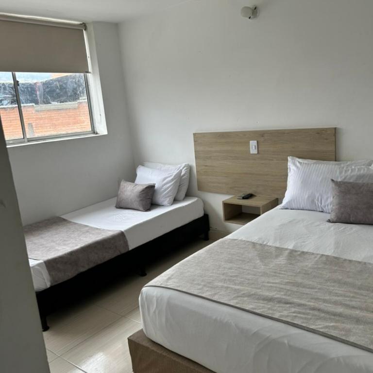 Hotel Suites 44 Laureles - Habitación Triple Básica - 9