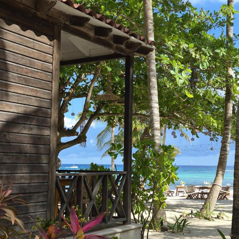 Petit Lafitte Beach Front Hotel & Bungalows - OceanFront Bungalow - King Bed - 3