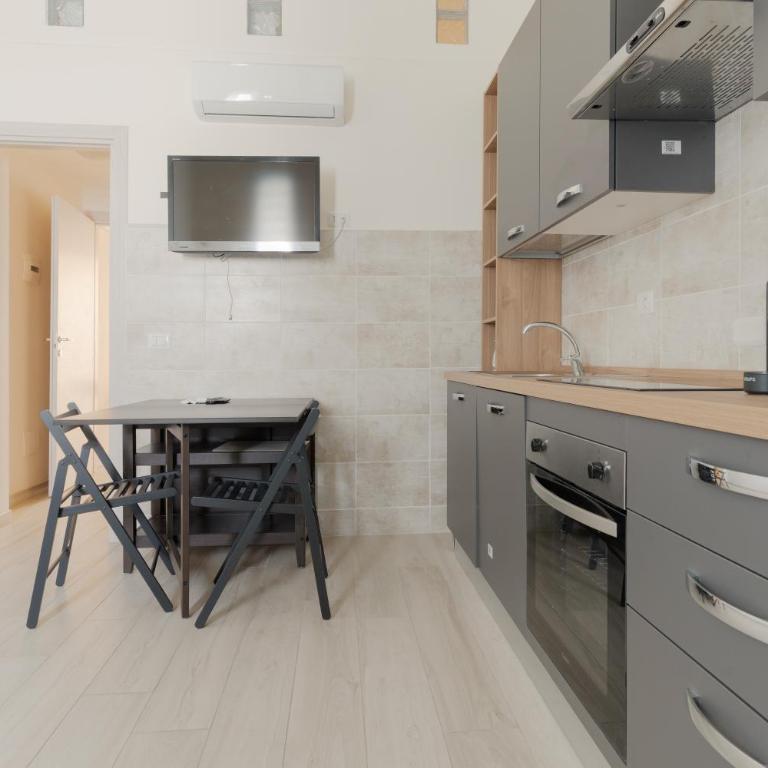 GuestHost - Cozy Loft with Mezzanine Milan - Appartamento con 1 Camera da Letto - 6