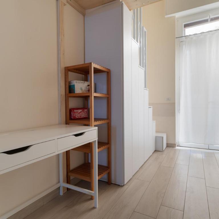 GuestHost - Cozy Loft with Mezzanine Milan - Appartamento con 1 Camera da Letto - 24