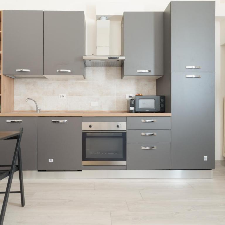 GuestHost - Cozy Loft with Mezzanine Milan - Appartamento con 1 Camera da Letto - 4