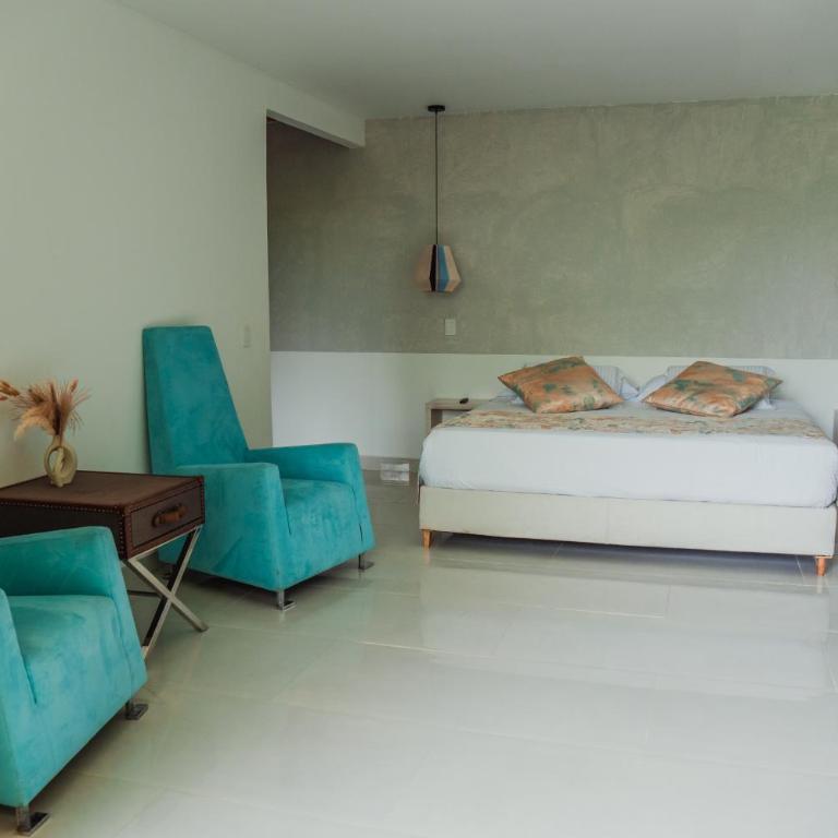 Hotel Terra Tacuara - Suite con cama grande y balcón - 5