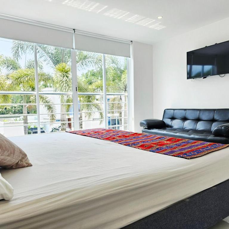 Casa con piscina privada cerca al Aeropuerto - Four-Bedroom House - 28