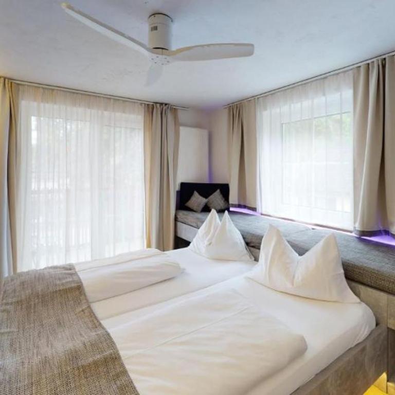 Boutique Hotel Adler - Deluxe Familienzimmer - 10