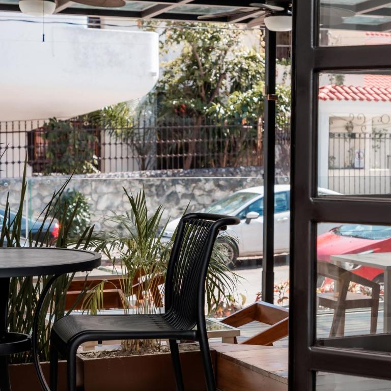 Mojarra Condo Boutique - Suite con cama grande y balcón - 14