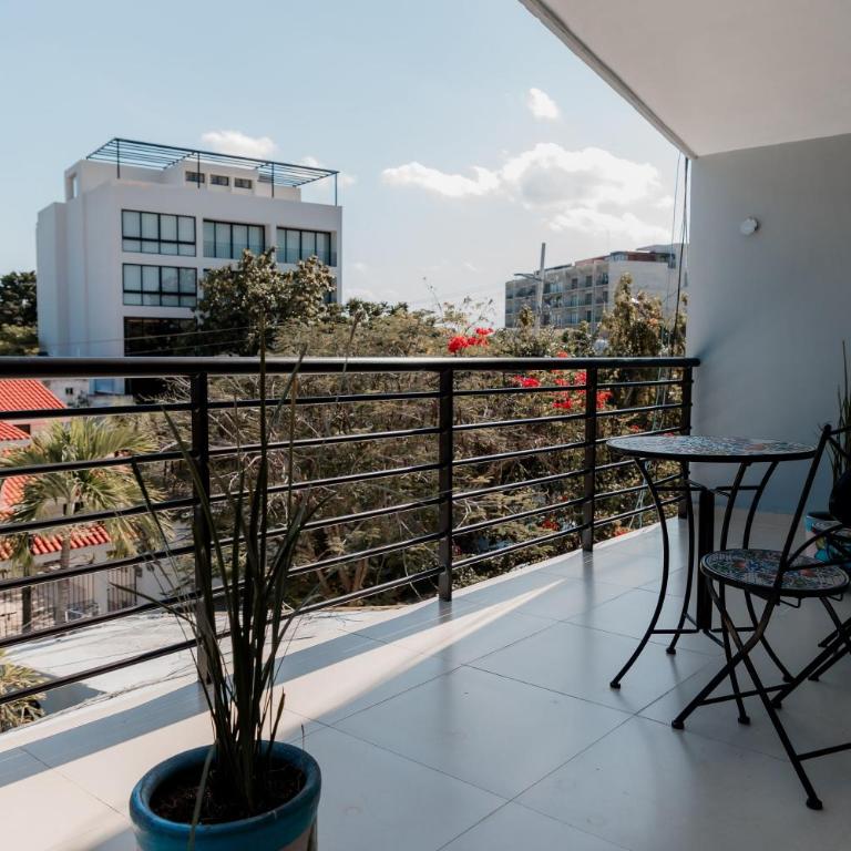 Mojarra Condo Boutique - Suite con cama grande y balcón - 7