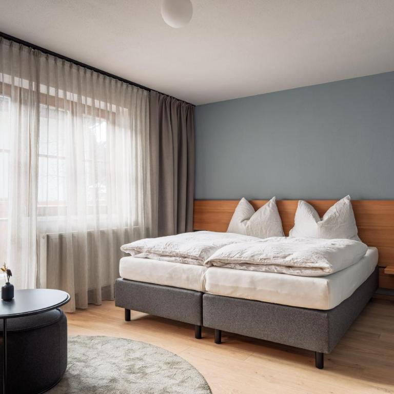 Julius Appartements & Zimmer - Deluxe Doppel-/Zweibettzimmer mit Balkon - 13