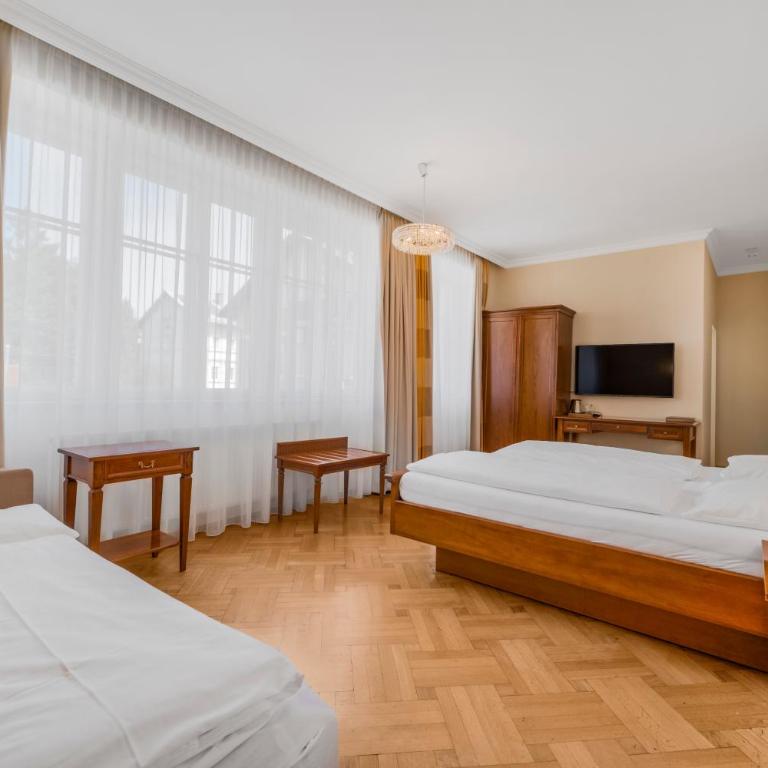 Villa Ceconi by Das Grüne Hotel zur Post - 100% BIO - Dreibettzimmer - 1