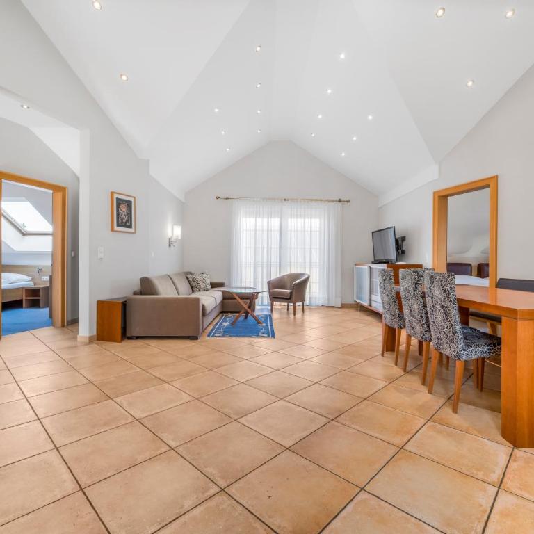 Holiday Apartments by Das Grüne Hotel zur Post - 100 % BIO & Villa Ceconi - Penthouse Apartment - including roof top - 4