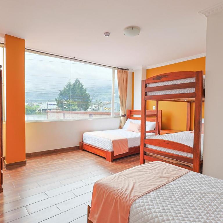 Hotel Quitus Airport - Habitación Cuádruple Dúplex - 2
