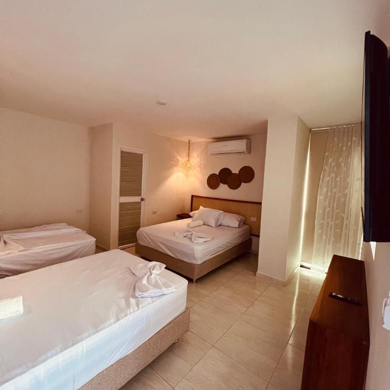 Aparta hotel brisas Del tayrona - Habitación Doble con vistas a las montañas - 2 camas - 3