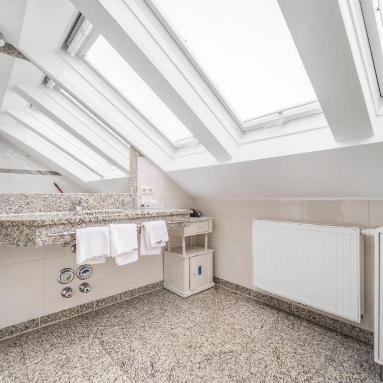 Holiday Apartments by Das Grüne Hotel zur Post - 100 % BIO & Villa Ceconi - Studio - 4