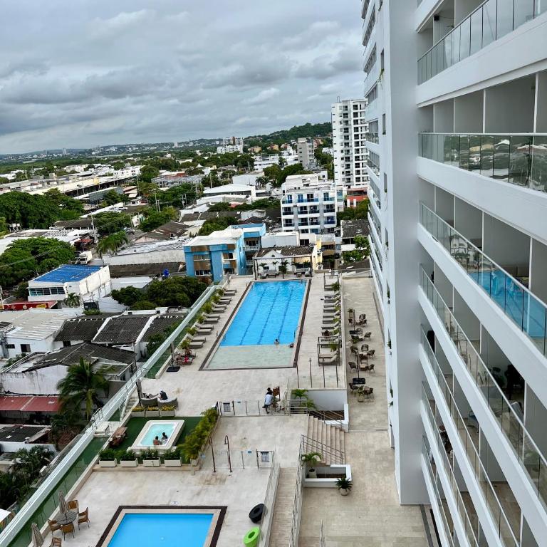 Lovely Suite steps away from the airport and sea - One-Bedroom Apartment with Pool View - 24