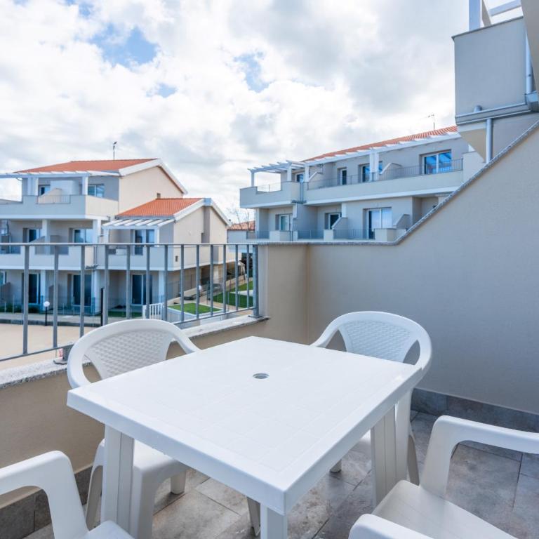Affittimoderni Castelsardo - Larotonda sul Mare - Appartamento con Vista Piscina - 11