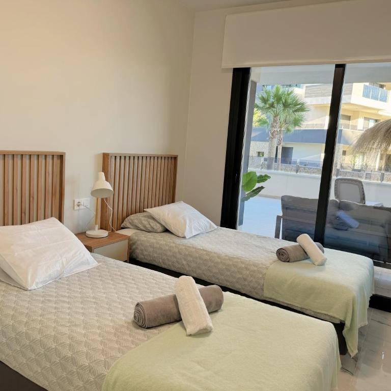 Modern Appartement met Zwembad - Playa Flamenca - Apartamento de 2 dormitorios con vistas a la piscina - 8