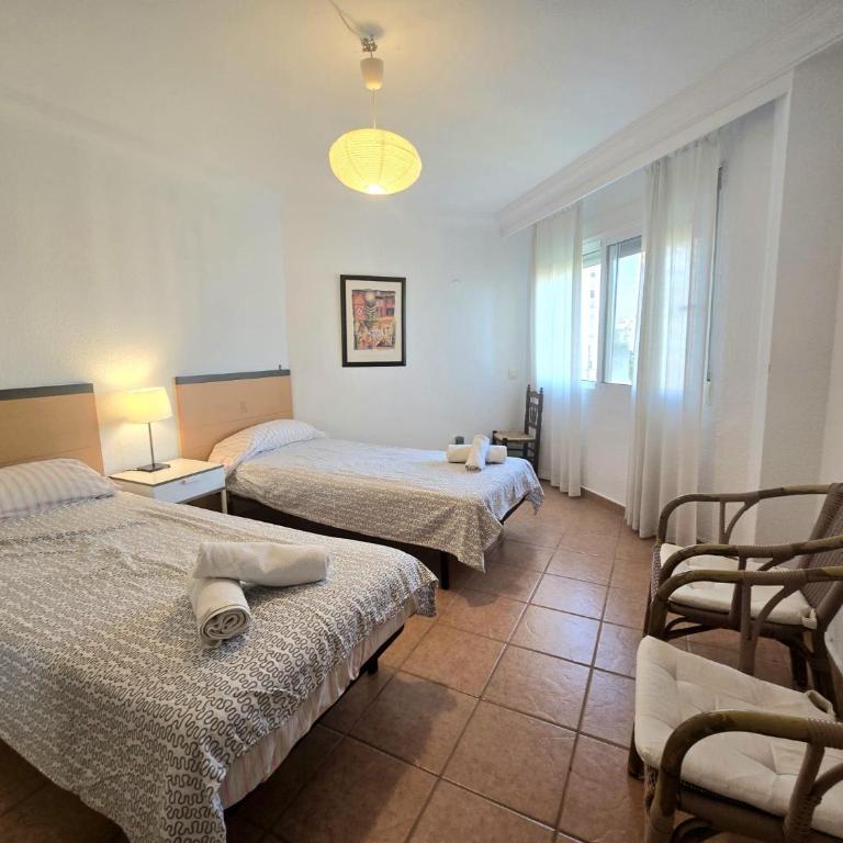 Apartamento Playamar con vistas al mar y piscina a 50 metros del Paseo Marítimo - Apartamento de 2 dormitorios - 22