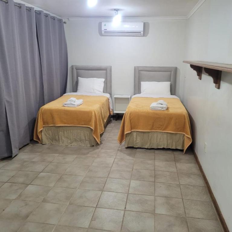 BauHouse Comfort Suites Asuncion - Habitación Familiar con baño privado - 2