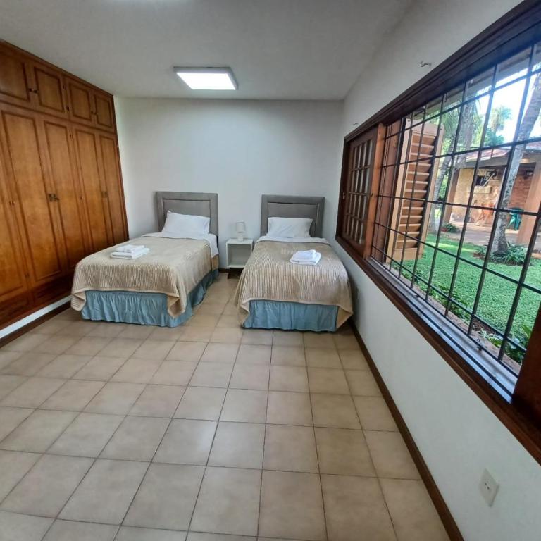 BauHouse Comfort Suites Asuncion - Habitación Doble con vistas a la piscina - 2 camas - 5