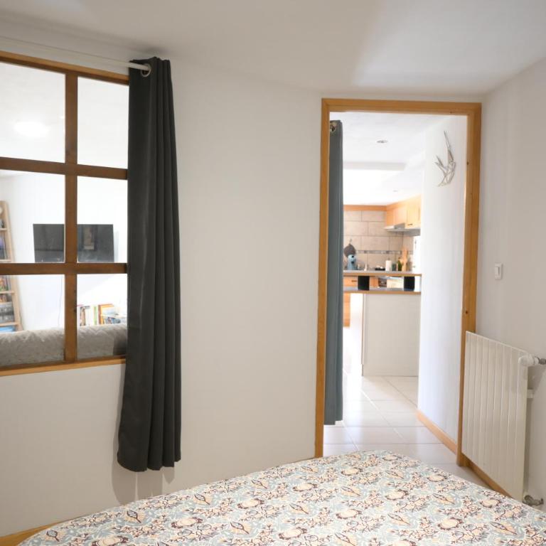 Le Nid du Chat Noir - Gîte La Maison Alvéole - Appartement - Vue sur Jardin - 9