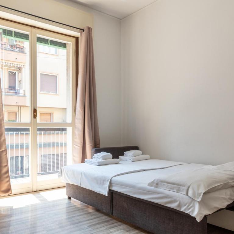 DeHomes - Ampia casa in centro 3 camere e 2 bagni - Appartamento Premium con 3 Camere da Letto e Balcone - 4