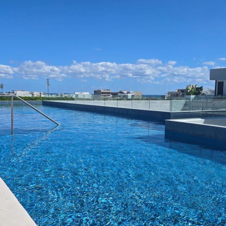 Playa's Golden Area -- Casa Omega 2BR 2BA tropical retreat, beach, infinite Pool, Gym - Two-Bedroom Apartment with Balcony - 5