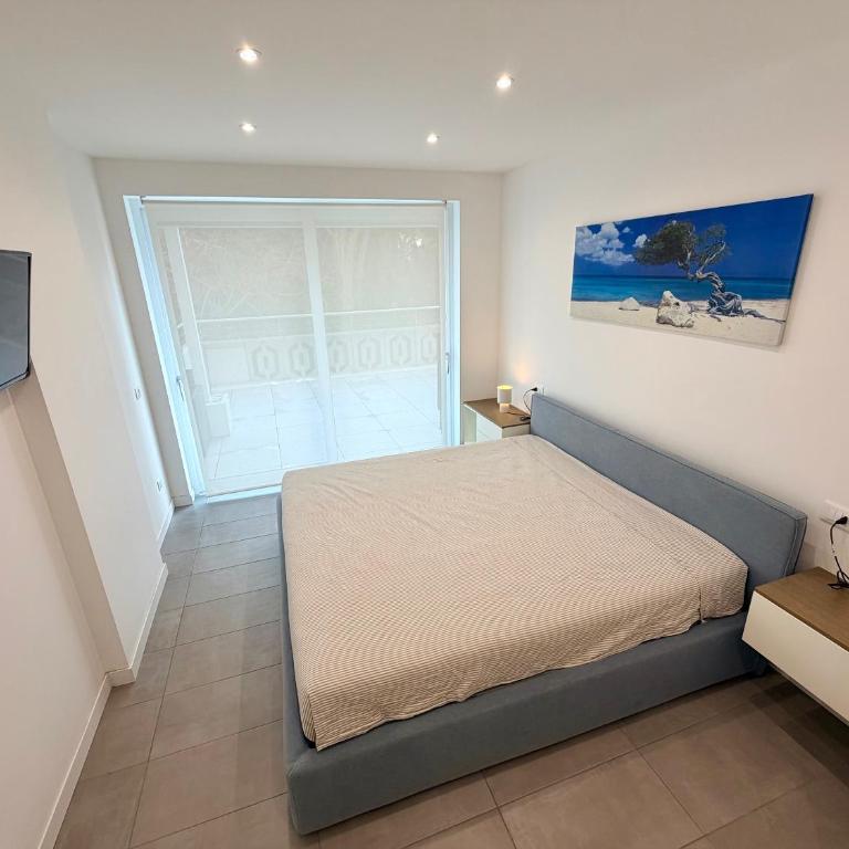 Residence Millefiori - Appartamento Deluxe con 2 Camere da Letto e Vista Giardino - 11