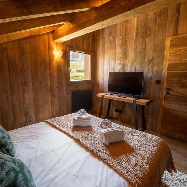 Perle Noire chalet dexception avec jacuzzi et saun - Maison de Vacances - 26