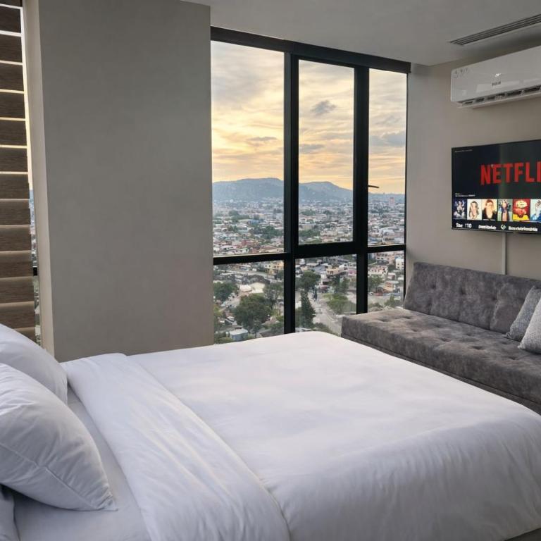 Apartamento moderno con vistas a la ciudad, 2 dormitorios, sala de estar y cocina equipada en la planta superior - Two-Bedroom Apartment with City View - 6